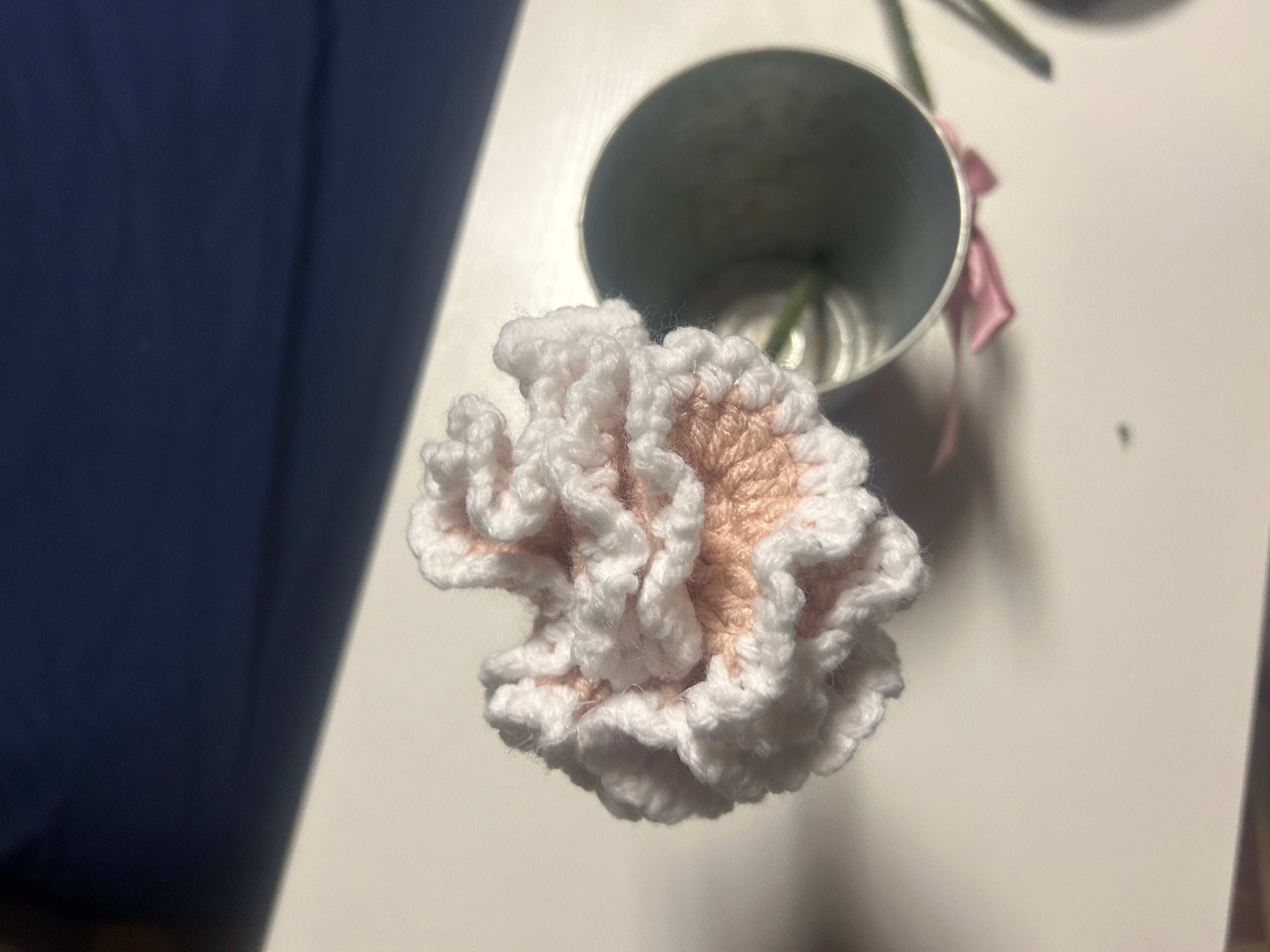 Pike and white carnation flower
